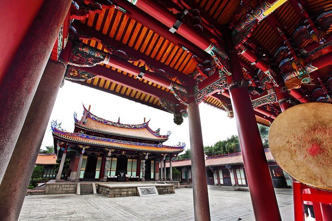 A ceremonial drum and painted eaves framing the Taipei Confucius Temple courtyard